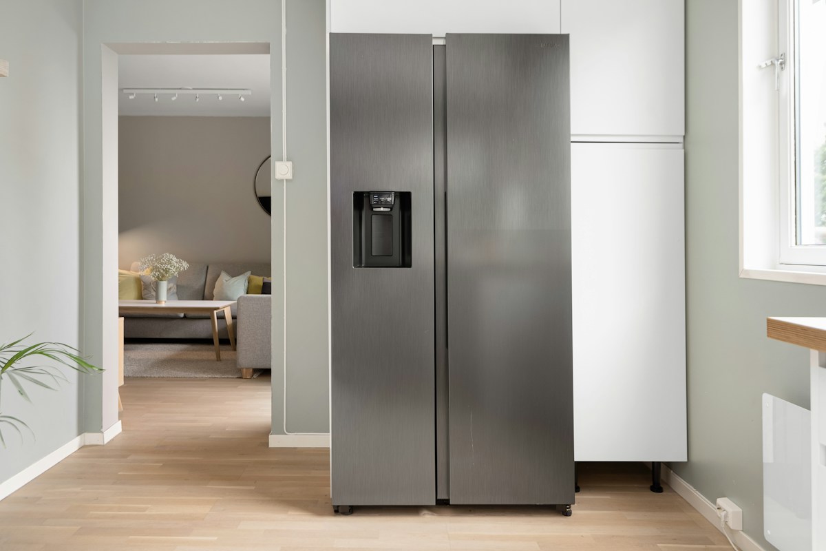 Refrigerator in a light-filled kitchen